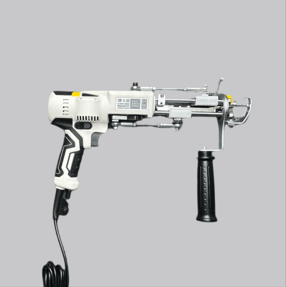 A tufting gun with a black handle and a white body, featuring a guide light and a speed display.